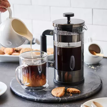 French press coffee and glass coffee mug